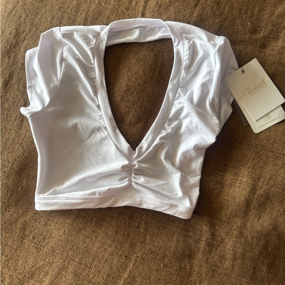 Bombshell Sportswear White Cap Sleeve Cut Out crop top